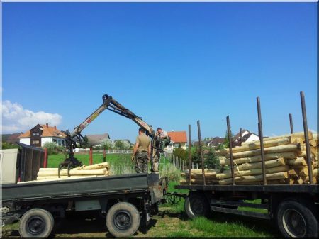 Loading of acacia poles piece