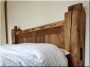Bed frame made of antique wooden beams