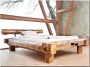 Bed frame made of antique wooden beams