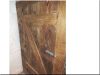 Cabinet door made of broken planks
