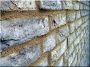 Brick wall made of broken bricks
