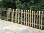 Rustic acacia fence from halved poles