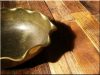 Curled brass serving bowl