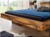 Bed frame made of antique wooden beams