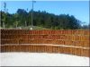 Retaining wall from edged locust planks, 62 cm